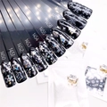 Фольга переводная Zoo Nail Art №1457 новогодняя черная серебро, 4*50 см zn/1457